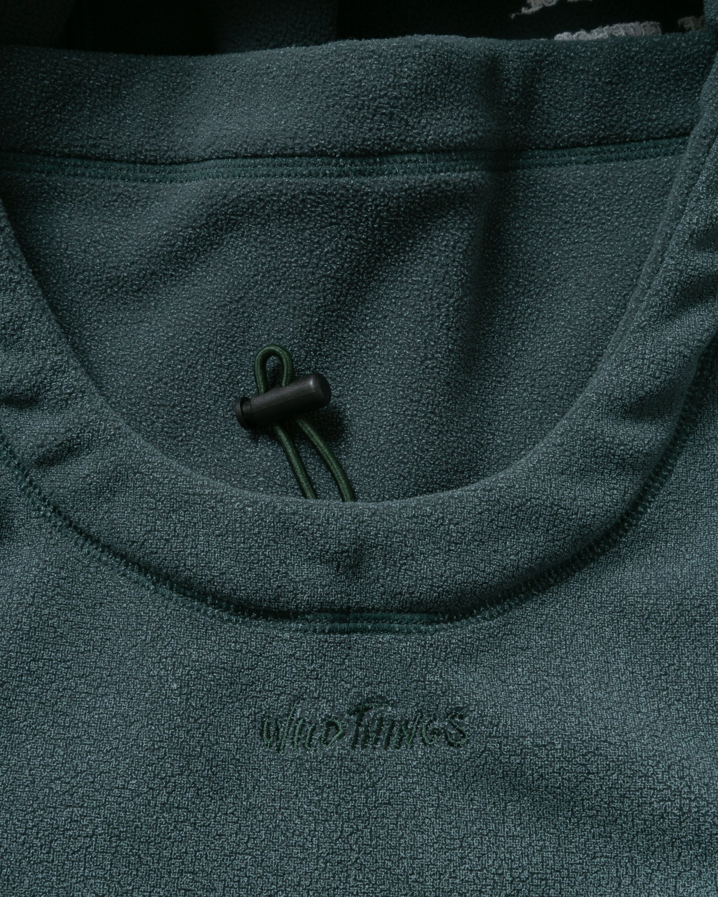 INNAT "PIGMENT PRINT WASH POLARTEC STORM HOODIE" / インアット "製品染めポーラテックフーディー"